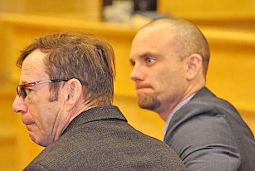 ['Diane Crocker/The Western Star<br />Lawyers Brian Dunphy, left, and Robby Ash are seen in provincial court in Corner Brook on Thursday. Dunphy is co-counsel for Dillon Bourgeois and Ash is representing Paxton Sheahan, the two men charged with the attempted murder of Jonathan Park.']