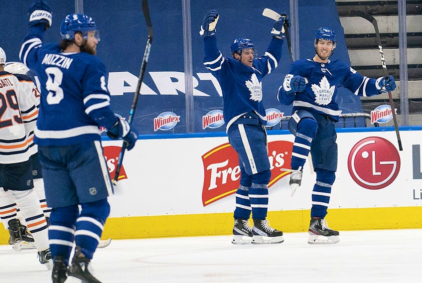 The Toronto Maple Leafs celebrate a goal during Saturday's overtime win over Edmonton. 