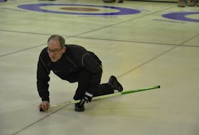 Sean Ledgerwood follows his shot during play in the recent P.E.I. Tankard provincial men’s curling championship in O’Leary. Ledgerwood played second for the winning Eddie MacKenzie rink. The Cornwall resident also won the P.E.I. senior men’s curling championship as a member of the Philip Gorveatt rink.