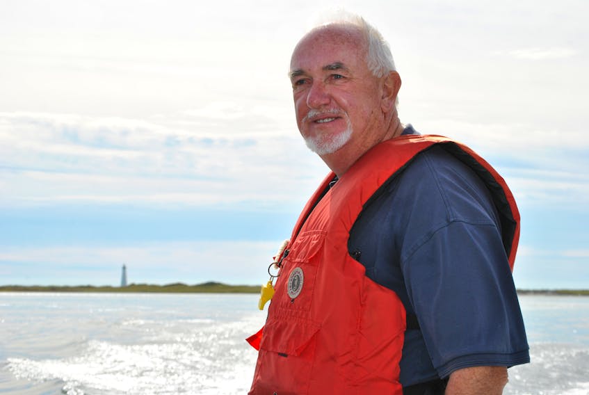Ferrying people by outboard boat to The Cape Ledge to visit Nova Scotia’s tallest lighthouse is just one of the many volunteer tasks that Leigh Stoddart has done numerous times during his 26 years as Mayor of Clark’s Harbour.