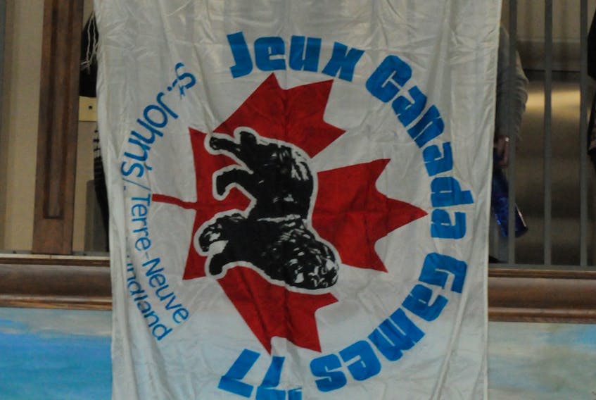 St. John’s first hosted the Canada Summer Games in 1977 and a flag from that event 43 years ago hung from the balcony above the Confederation Building’s east block on Tuesday. — TheTelegram/Joe Gibbons
