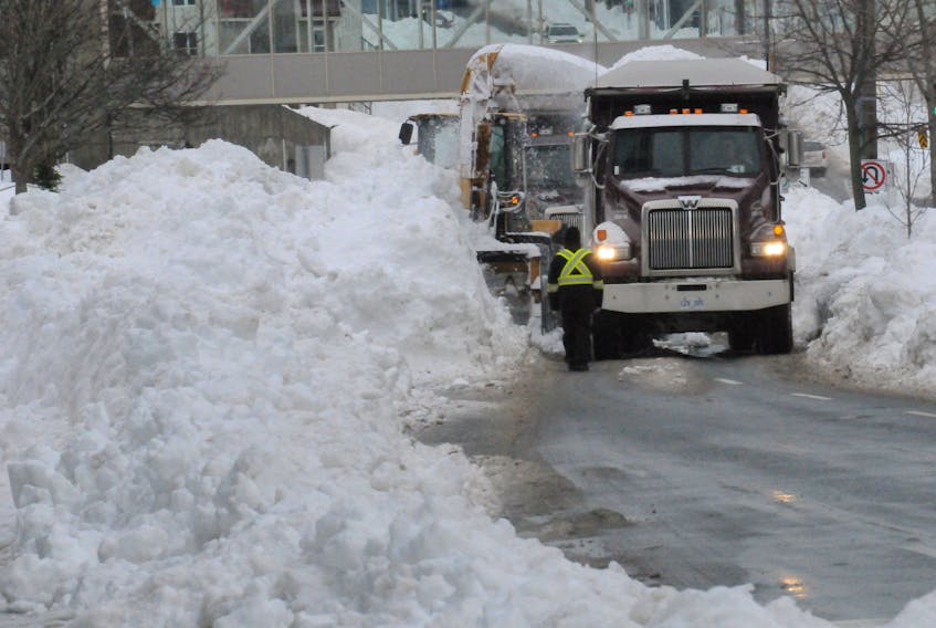 Snow being removed from New Gower Street in downtown St. John’s after the Jan. 17 blizzard. TELEGRAM FILE PHOTO