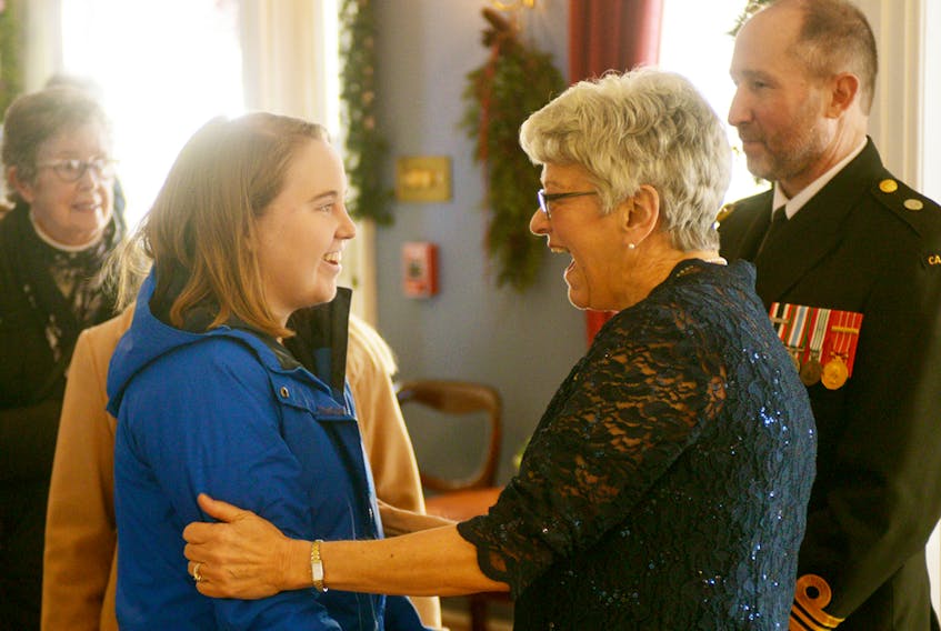 Lt.-Gov. Antoinette Perry shares a laugh with Olivia Batten during the Fanningbank levee held on New Year’s Day. Batten and her mother Christine drove to Charlottetown from Alberton to wish Perry a happy new year. MITCH MACDONALD/THE GUARDIAN