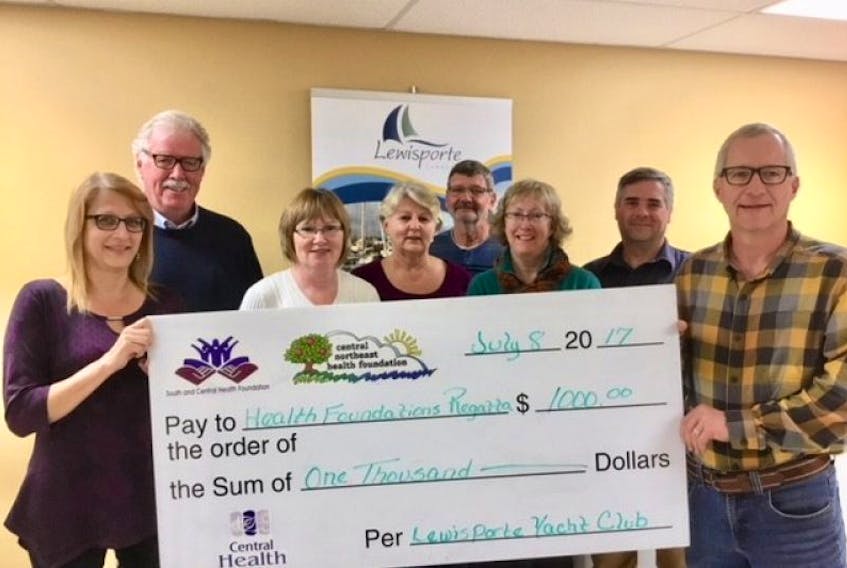 The Lewisporte Yacht Club presented $1,000 to the Health Foundations of Central. Pictured (from left) are members of the yacht club's executive - commodore Roxanne Haliburton, Lucien Forbes, Joanne Gill, Maureen Dalley, Mike Cook, Arlene Cook and Peter Haliburton - and South and Central Health Foundation board member Leon King.