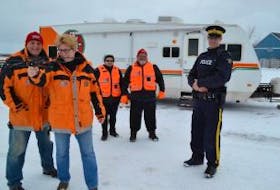 ['<p>PEI Ground Search and Rescue (PEIGSAR) volunteers, from left, John Toner and Heather Pringle demonstrate how the Project Lifesaver’s RF receiver works to locate Project Lifesaver clients. Looking on are PEIGSAR volunteers Donna and Austin Perry and Prince District RCMP/PEIGSAR liaison Cpl Al Vincent.</p>']