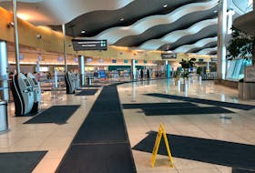 This March 2020 file photo shows an empty St. John’s airport terminal just after pandemic measures were introduced. The airport authority has mandated all passengers and staff wear masks in the building as of Friday in anticipation of increased traffic from relaxed Atlantic Canada border rules. 