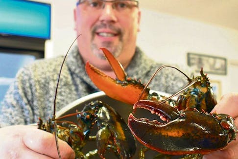 <p>Clawing his way into business, Melvin Ford has opened The Lobster Pot in Georgetown.</p>