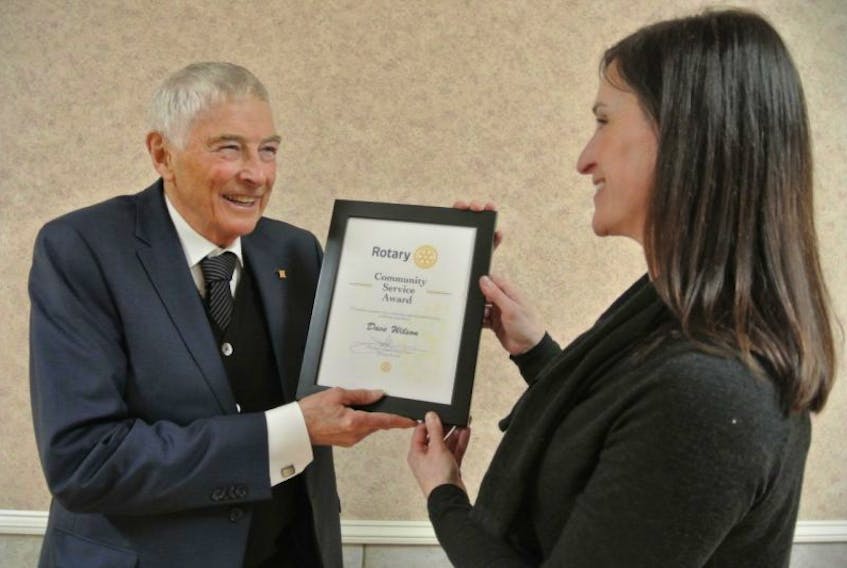 <p>Dave Wilson receives a congratulatory hug from his daughter Leslie during the annual Rotary Club of Truro’s Charter Night. The Truro resident was given a Community Service Award. Monique Chiasson – Truro Daily News</p>