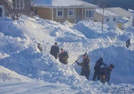 Members of the Canadian military clear snow for residents of the St. John's metro area during Snowmageddon. Contributed