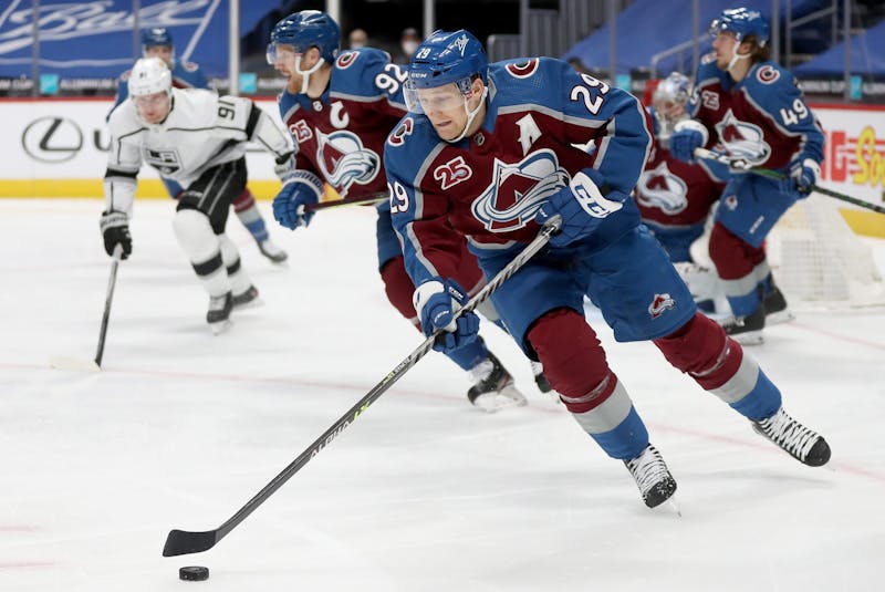 Colorado Avalanche forward Nathan MacKinnon carries the puck against the Los Angeles Kings. - Matthew  Stockman