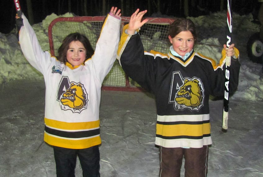The road to the 2019 Canada Winter Games for sisters Kara (left) and Ella MacLean started as members of the Antigonish Minor Hockey Association and – like so many youngsters across Canada – on the family backyard rink. Contributed
