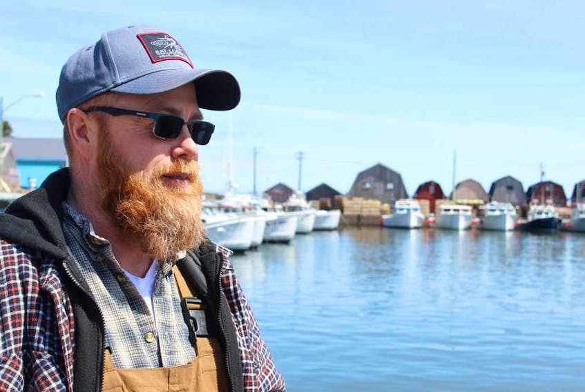 Chris Wall gets ready to fish out of Malpeque Harbour in this 2019 photo.