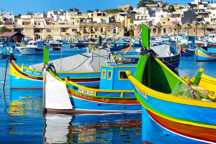 According to tradition, the colours of these Maltese fishing boats represent a fisherman's home village. (Gretchen Strauch)