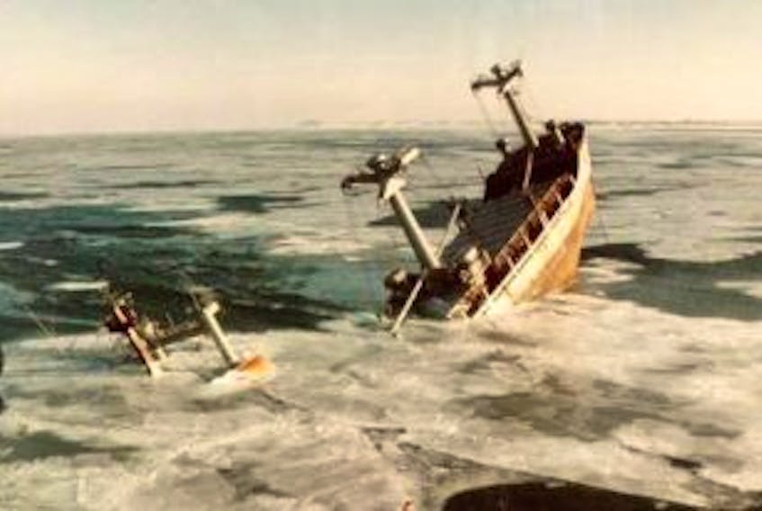 ['<p>The <em>Manolis L. </em>as it sunk off the coast of Change Islands in 1985.</p>']