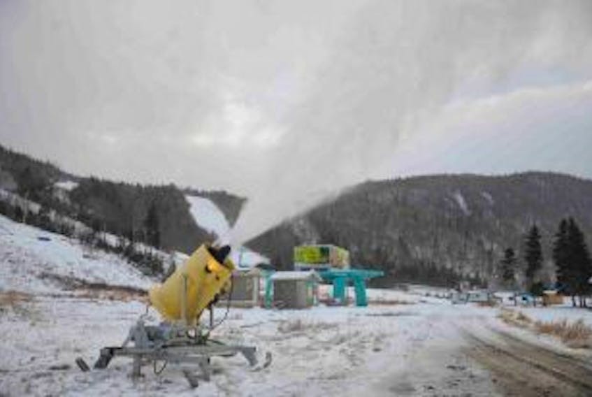 ['The first snow gun at Marble Mountain began producing artificial snow at the base of the ski hill Monday afternoon.']