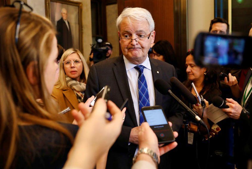 Canada's Minister of Transport Marc Garneau speaks to media on Parliament Hill in Ottawa, Ontario, Canada March 9, 2020.