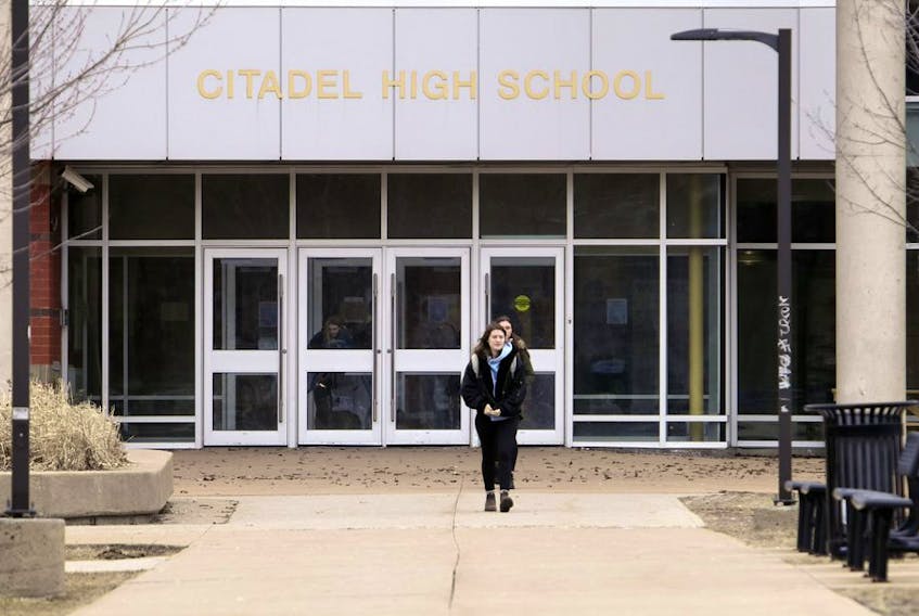 Students start to file out of Citadel High School in Halifax on Friday, the last day of school in Nova Scotia before the March break.