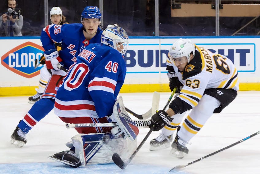 Brad Marchand of the Boston Bruins scores his 300th career goal at 7:51 of the third period against Alexandar Georgiev of the New York Rangers at Madison Square Garden on Friday. (USA TODAY Sports)