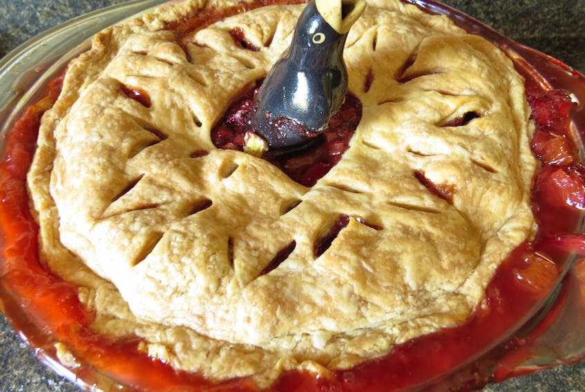 My strawberry rhubarb pie is shown with a pie bird from my late mother-in-law's kitchen. Margaret Prouse photo