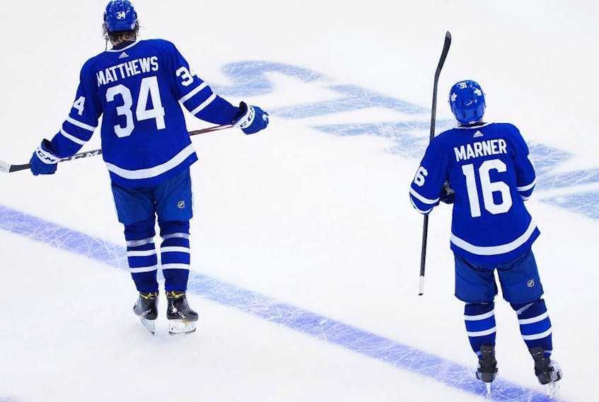 Auston Matthews and Mitch Marner of the Maple Leafs look on following their lose to the Columbus Blue Jackets 3-0 in Game Five of the Eastern Conference Qualification Round prior to the 2020 NHL Stanley Cup Playoffs at Scotiabank Arena on August 9, 2020 in Toronto, Ontario. 
