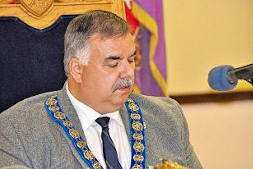 ['<p>Diane Crocker/The Western Star</p>\n<p>Mayor Charles Pender is seen during Monday night’s council meeting. As part of the city’s 60th anniversary celebrations the public meeting was held at the Royal Canadian Legion.</p>']