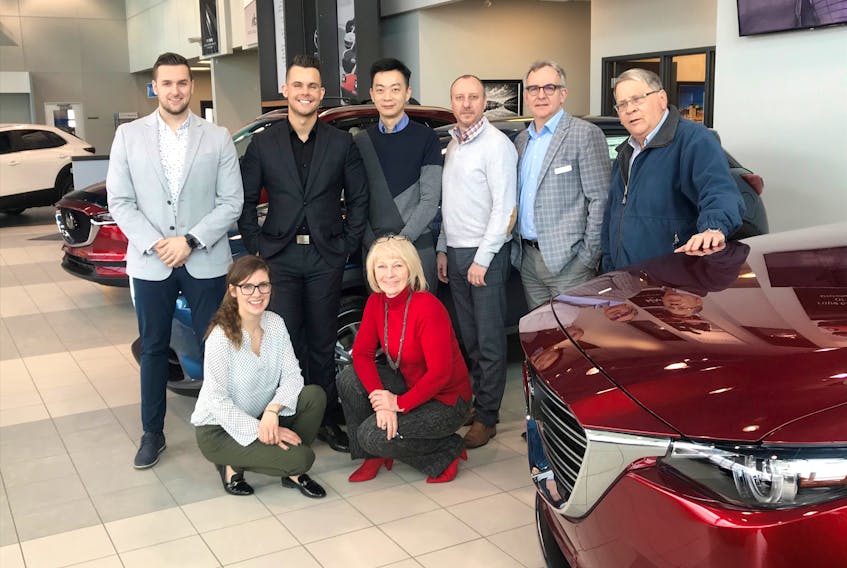 The Steele Mazda St. John’s sales team would like you to test drive a Mazda and experience its affordable luxury. (Front row, from left: Kim Follett, Marie Riley. Back row, from left: Kory Waterman, Liam Furlong, Ian Wang, Greg Ryerson, Gerry Carew, Bob Rose. Missing from photo: Cathy Miller and Terry Nugent.) - Contributed.