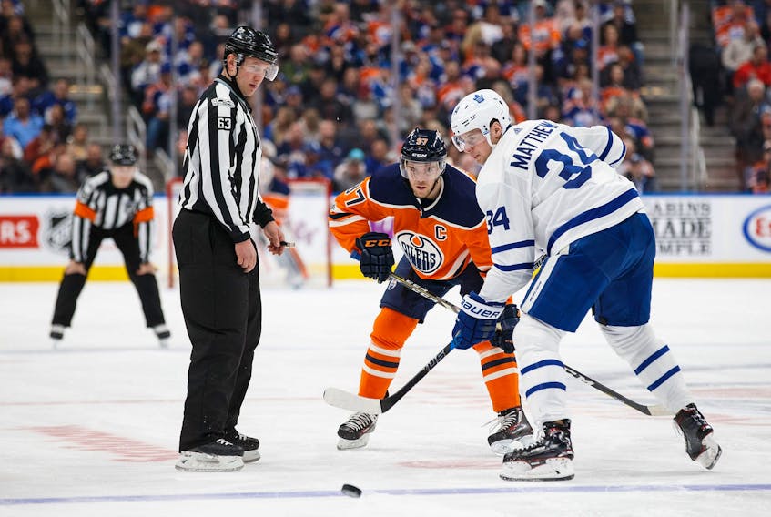 Seeing Connor McDavid (left) face off against Auston Matthews in the Winter Olympics would be a dream come true, but Canada should boycott Beijing, writes Steve Simmons.