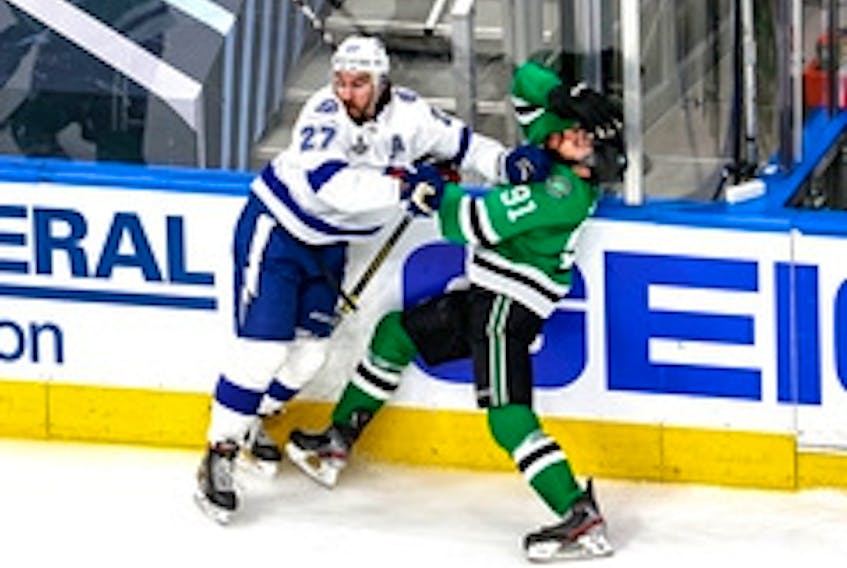 Ryan McDonagh (left) of the Tampa Bay Lightning checks Tyler Seguin of the Dallas Stars during Game 6 of the Stanley Cup Final. It's still unclear whether the Lightning will have a chance to defend their title in 2020-21.