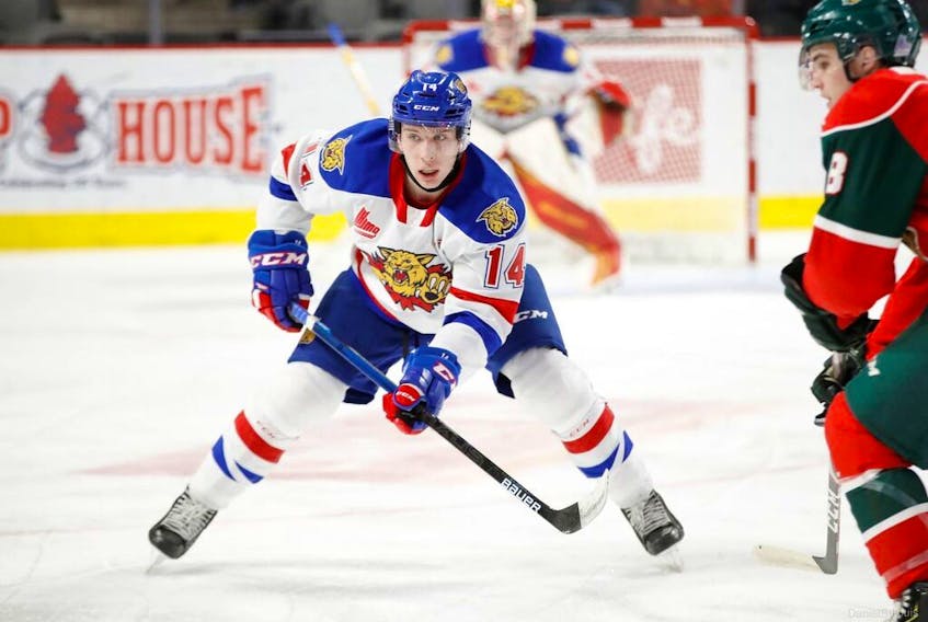Moncton Wildcats defenceman Jared McIsaac tracks the puck during his first game against the Halifax Mooseheads since they traded him earlier in the month. The Wildcats beat the Mooseheads 8-0 in Moncton. (QMJHL/Daniel St-Louis)