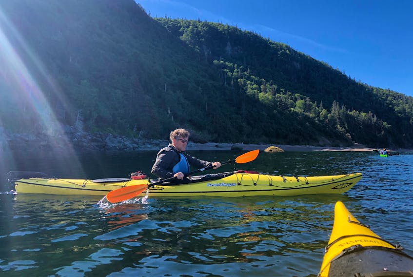 Ian White kayaking in Gros Morne. He also enjoys kayaking in his Yarmouth County hometown. CONTRIBUTED