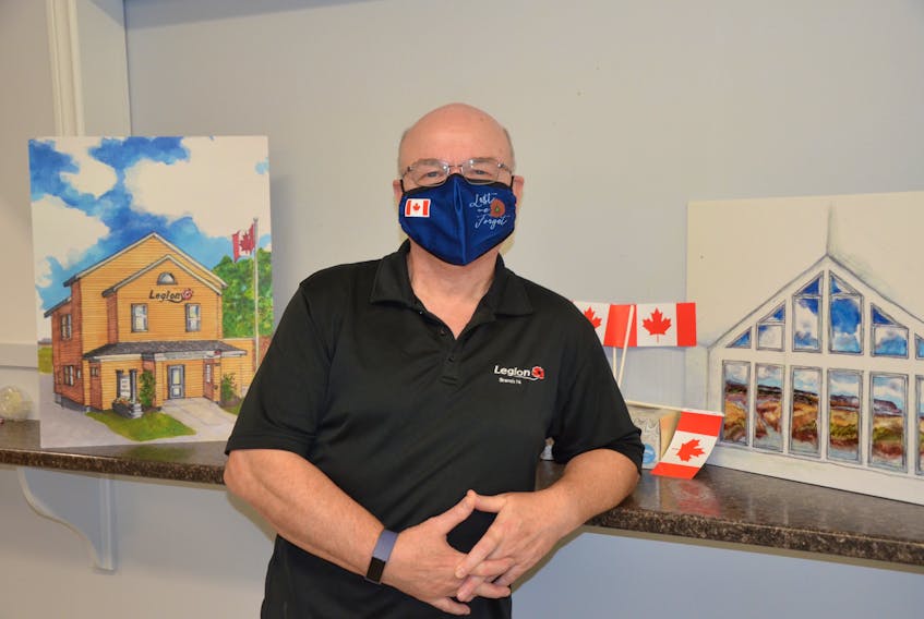 Volunteer Paul Murphy with renderings by interior designer Therese Harvey showing what the Wolfville Legion building will look like following an extensive renovation project. He points out that they’re selling Legion masks like the one he’s wearing as part of this year’s Poppy Campaign. KIRK STARRATT