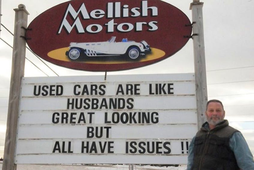 <span class="COLOURKicker">John Mellish, owner of Mellish Motors in New Annan, is shown with the latest billboard sign outside his business. One such recent sign, stating that "women can't drive" has resulted in death threats to both himself and those who've raised concerns about his sign.</span>