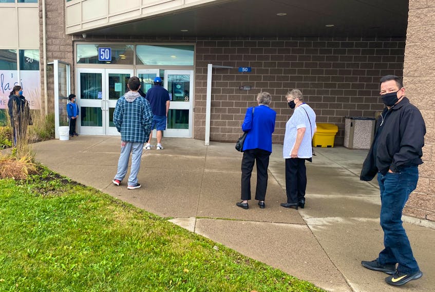 A small lineup formed at the Membertou Trade and Convention Centre where residents cast their ballots in the Jenu Room. Traffic in and out went smoothly and security was on hand to ensure social distancing. OSCAR BAKER III/THE CAPE BRETON POST 