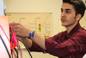 Mohammad Zamanlou at work in an electrical lab at Memorial University. -TELEGRAM FILE PHOTO