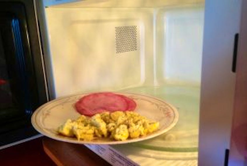 ['This feed of scrambled eggs and thinly-sliced ham was prepared entirely in the Panasonic inverter microwave oven, at power level 2. — Photo by Geoff Meeker/Special to The Telegram']