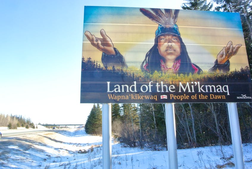 This sign on Highway 104 near Amherst was defaced early Monday when someone scrawled “NS Needs Mills” across its bottom. Mi’kmaq artist Leonard Paul, who created the artwork for the sign, said he has been overwhelmed with the messages of support he has received from around the world. Darrell Cole – Amherst News