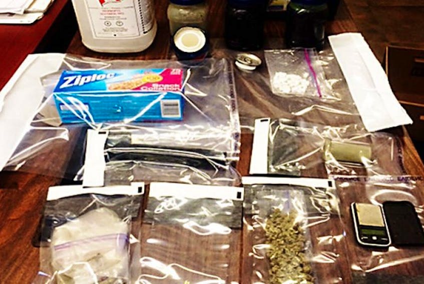 Photo from the RCMP of items seized during a raid of a residence at Milton Station on April 2, 2014.
