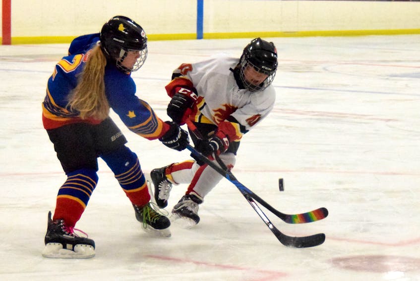 Players from Clare and Shelburne battle for the puck during the Fall Classic Peewee C minor hockey tournament at the Sandy Wickens Memorial Arena on Sherose Island, Nov. 9, 2019. (KATHY JOHNSON PHOTO)