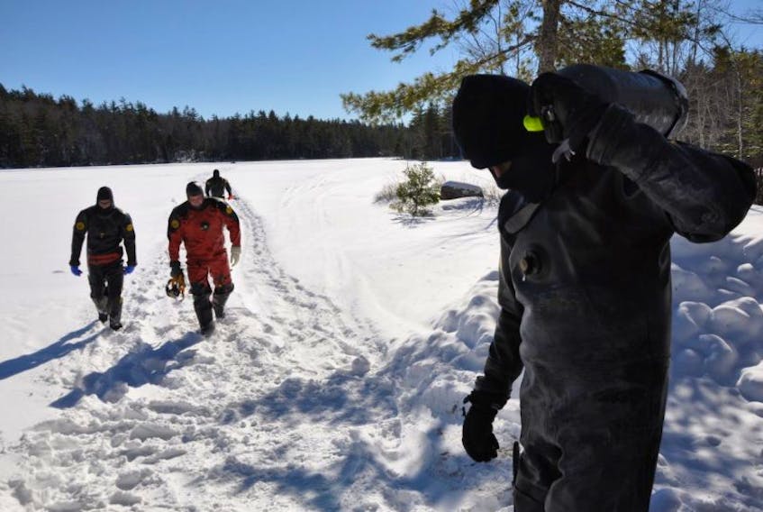 RCMP divers were searching Black River Lake in rural Kings County throughout the day Feb. 15. A 26-year-old New Ross man broke through the ice on the lake the evening of Feb. 13 and has not been located.