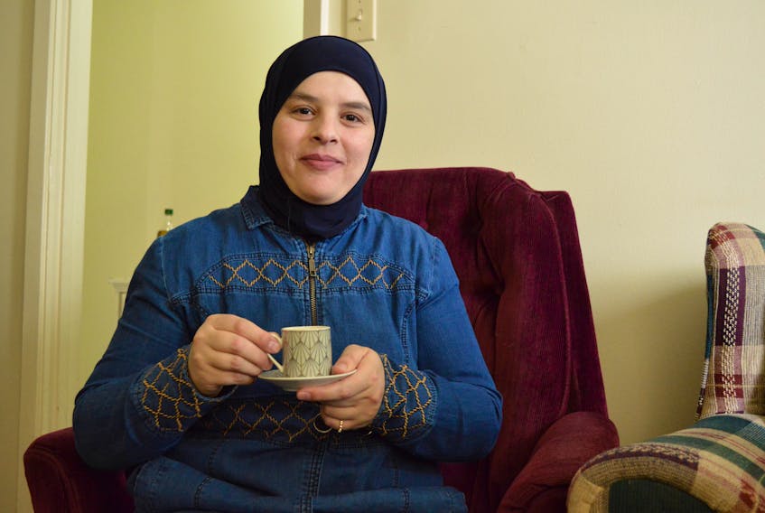 Zainab Aldos enjoys a cup of coffee in her Summerside home. Aldos has started a Syrian food business in the city offering fresh, healthy food to Islanders. Alison Jenkins/Journal Pioneer