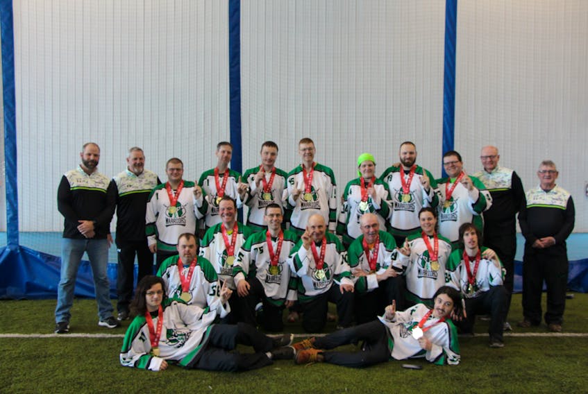 Team P.EI. won a gold medal in floor hockey in dramatic fashion at the recent 2020 Special Olympics Canada Winter Games in Thunder Bay, Ont. After going 1-1-1 in the round-robin format, an overtime goal by Tommy MacGuigan lifted P.E.I. to victory in its semifinal game and Nathan Irwin provided the overtime magic in the gold-medal game. Team members are, front row, from left: Keegan Waite and Micheal MacIsaac. Middle row: Travis Perry, Jeremy Cheverie, Shawn Mitchell, John Anthony Laybolt, Tommy MacGuigan, Lisa Bernard and Nathan Irwin. Back row: Jamie Henry (mission staff), CY Holland (head coach), Evan Costain, Brian McNab, Jeremy Wall, Geoffrey Bridges, Jennifer Hickox, Billy Acorn, Jerred Affleck, Peter Howatt (assistant coach) and Rickey Burns (assistant coach).