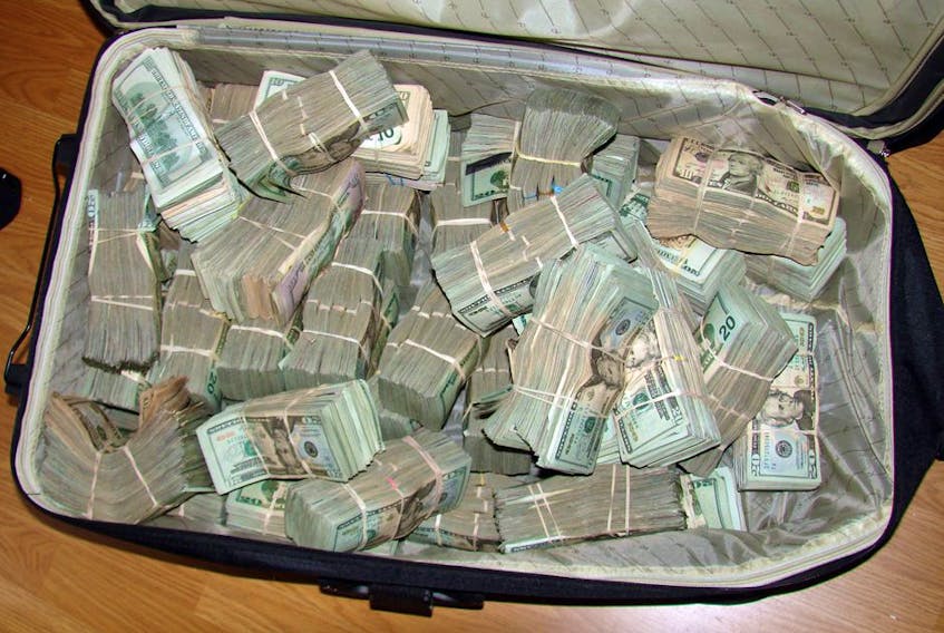  A suitcase of cash entered as evidence in Jimmy Cournoyer’s trial.
