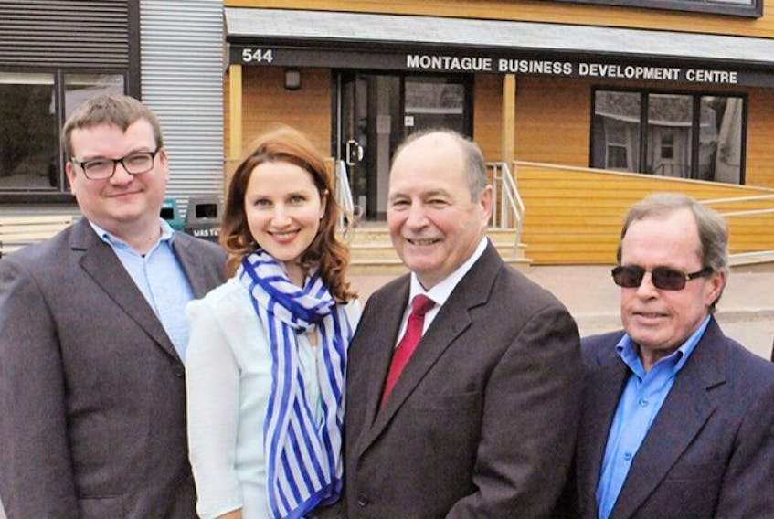 IT entrepreneurs Ron Myers, left, and Laura Jane Koers join Innovation Minister Allen Roach and Community Welfare League chair Scott Bell, right, at the opening of the new Montague Business Development Centre Wednesday.