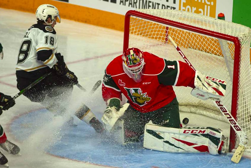 Charlottetown Islanders forward Justin Gill watches the puck beat Halifax Mooseheads goalie Alexis Gravel during Friday's QMJHL game at the Scotiabank Centre. (RYAN TAPLIN/Chronicle Herald)