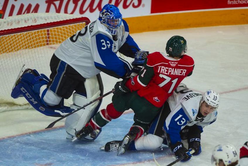 Halifax Mooseheads winger Maxim Trepanier and Saint John Sea Dogs goalie Zachary Bouthillier collide during Saturday's QMJHL game at the Scotiabank Centre. (RYAN TAPLIN/CHRONICLE HERALD)