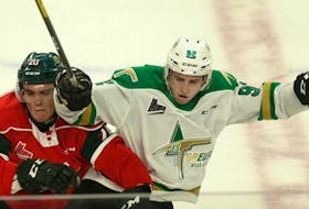 Halifax Mooseheads defenceman Justin Barron, left, and Val-d'Or Foreurs forward Jeremy Michel collide during Sunday's QMJHL game at the Scotiabank Centre. (TIM KROCHAK/The Chronicle Herald)