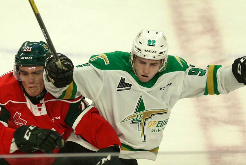 Halifax Mooseheads defenceman Justin Barron, left, and Val-d'Or Foreurs forward Jeremy Michel collide during Sunday's QMJHL game at the Scotiabank Centre. (TIM KROCHAK/The Chronicle Herald)