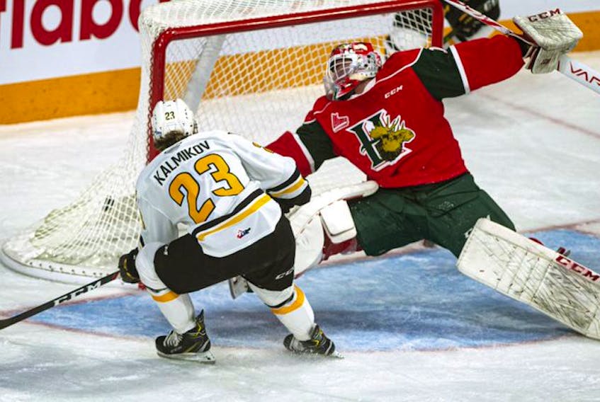 Cape Breton Eagles winger Brooklyn Kalmikov scores on Halifax Mooseheads goalie Alexis Gravel during Tuesday's QMJHL game at the Scotiabank Centre. The Eagles won 7-1. (RYAN TAPLIN/Chronicle Herald)