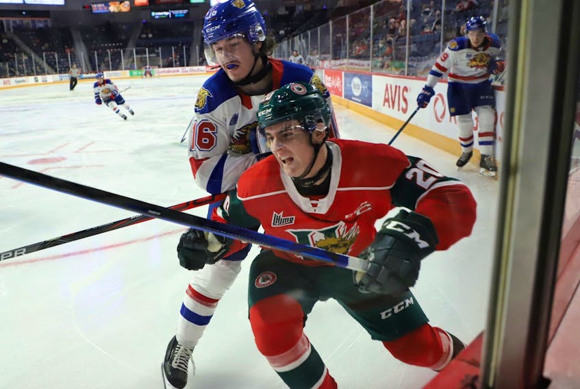 Moncton Wildcats forward Francis Langlois collides with Halifax Mooseheads defenceman Justin Barron, during first period QMJHL action at the Scotiabank Centre on Thursday. (TIM KROCHAK/Chronicle Herald)