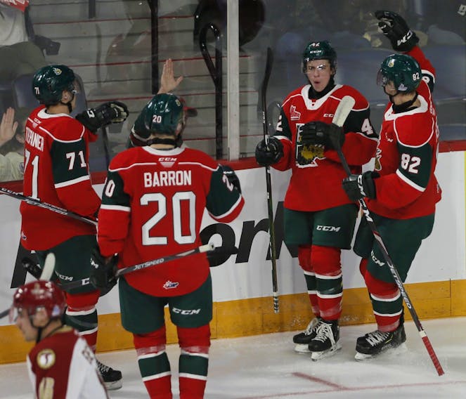 Halifax Mooseheads forward Zack Jones, second from right, celebrates with teammates following his first period goal against the Bathurst Titan Saturday night at the Scotiabank Centre. (TIM KROCHAK/ The Chronicle Herald)